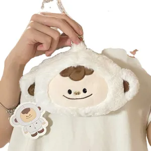 Piccola borsa a tracolla in peluche bianco a forma di mostro per cuffie, stile cartone