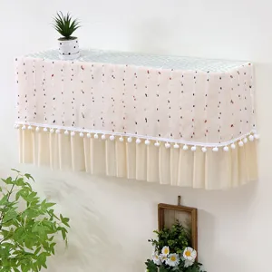 Copertura decorativa per condizionatore a muro con pompon e eleganti balze a pieghe