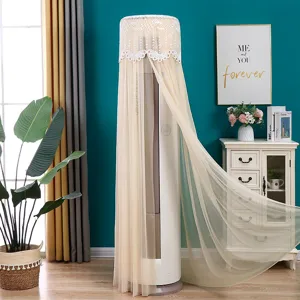 Detailed view of champagne lace dust cover on a cylindrical air conditioner unit