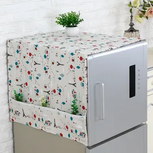 Detalle de funda para refrigerador con bolsillos y estampado Torre Eiffel