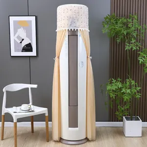 Elegant cream lace dust cover for cylindrical floor-standing AC with pom-pom trim