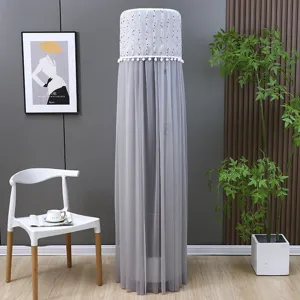 Grey lace dust cover for cylindrical tower air conditioner in modern living room