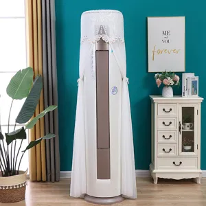 Elegant white lace dust cover on a vertical cylindrical air conditioner in a living room.