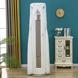 Elegante copertura per condizionatore cilindrico in pizzo bianco con ricamo floreale.