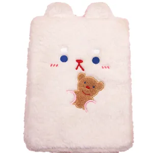 Detailed view of white plush iPad sleeve featuring cute embroidered animal design