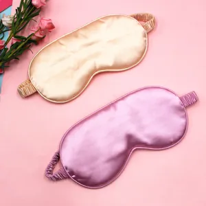High-quality silky satin sleep masks in pink and champagne gold for light blocking