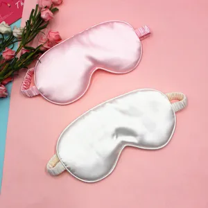 Pair of premium silk-like sleep masks in pink and white with comfortable elastic straps
