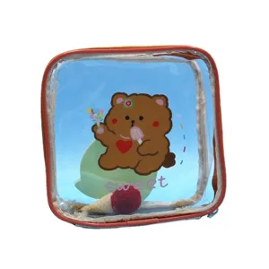 Borsa da trucco blu trasparente con motivo a orsetto e scritta 'sweet', ideale per il viaggio