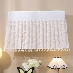 Detail of French style white AC dust cover with elegant tassels and fringe texture