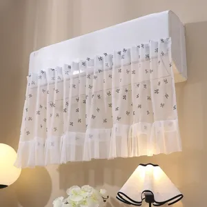Elegant white lace air conditioner dust cover featuring bow pattern and decorative ruffled edge
