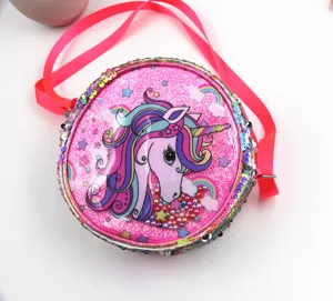 Detail of pink sequin unicorn crossbody bag for girls with glitter stars and rainbows
