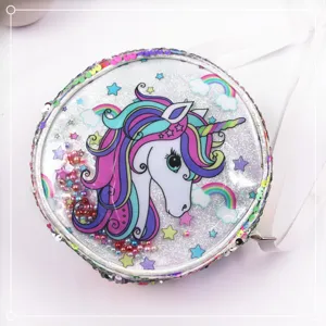 Close-up of a sequined unicorn crossbody bag with colorful rainbow glitter shaker beads.
