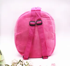 Detailed back view of a soft pink plush unicorn backpack showing adjustable shoulder straps