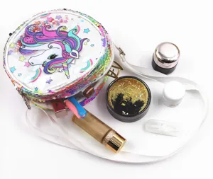 Detail of cartoon unicorn sequin shoulder bag showing interior storage space