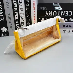 Detailed view of yellow and transparent large capacity pencil pouch with mesh pockets