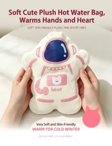 Soft plush astronaut shaped hot water bag detail with cozy pink and white fabric texture
