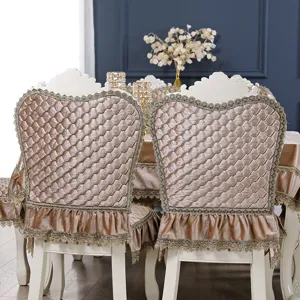 Detailed view of European champagne velvet chair covers featuring exquisite lace trim