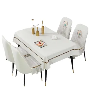 Elegant white quilted chair cover and tablecloth set for modern dining room décor