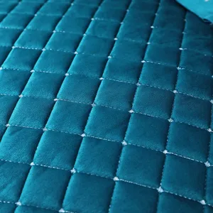 Détail de haute qualité sur le tissu en velours matelassé bleu cyan pour coussins de chaise