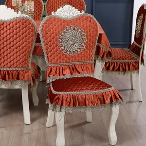 Detailed view of European quilted chair cover with lace trim and ruffled skirt