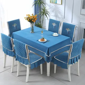 Blue quilted dining chair covers and matching tablecloth set for home decor