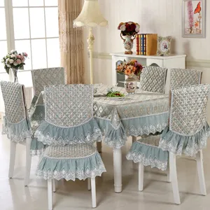Elegant light blue quilted tablecloth and chair cover set with lace trim