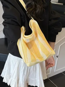 Elegante bolso de malla hueca a rayas amarillas para mujer con correa de gran capacidad