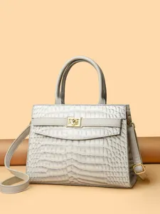 Elegant grey crocodile embossed handbag with golden flower lock and shoulder strap