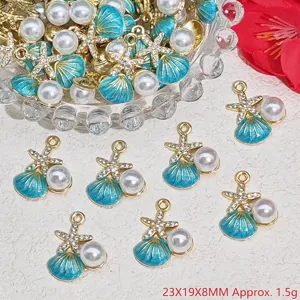 Close-up of alloy shell and starfish pendant with pearl and blue oil-drop finish.