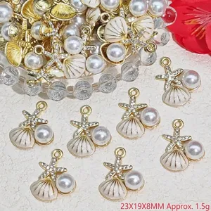 Close-up of pearl shell and starfish alloy charms for DIY jewelry making