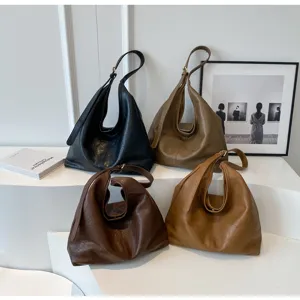 Four colors of minimalist vintage leather hobo bags for women commuting.