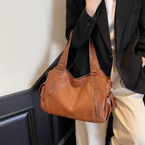 Stylish large brown faux leather tote bag for women fashion commuting and travel
