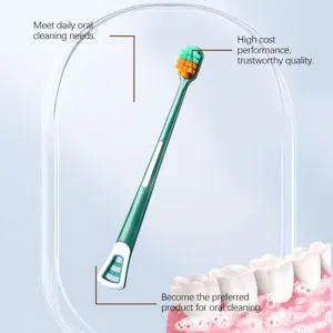 Detailed view of this wide-head toothbrush featuring soft bristles for gentle daily gum care