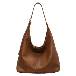Vintage brown leather hobo tote bag for women with an adjustable shoulder strap