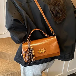 Vintage brown faux leather small square handbag with wooden bead tassel charm for women