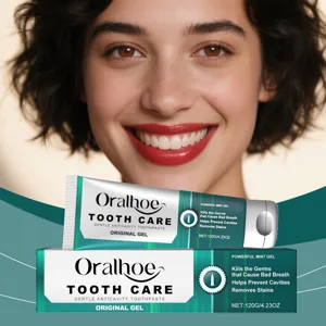 Detailansicht der Oralhoe Minzgel-Zahnpasta Tube mit einem strahlend weißen Lächeln im Fokus