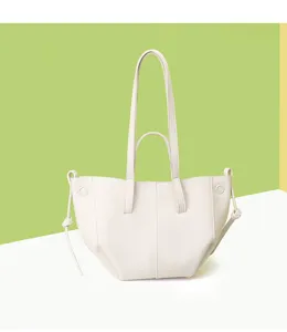 Front view of a minimalist cream-white large capacity wing-shaped tote bag