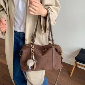 Vintage brown suede bowling bag with large capacity and shoulder strap for women