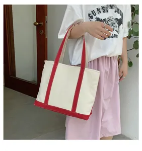 Large capacity cream and red canvas tote bag for women, stylish and casual shoulder handbag.