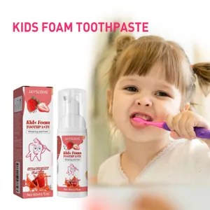 Kids strawberry foam toothpaste for teeth cleaning shown with a child brushing teeth