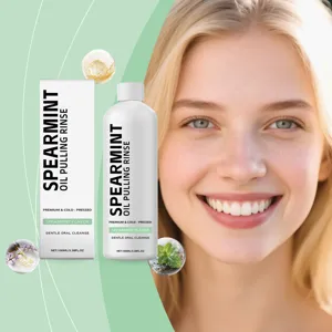 Spearmint oil pulling rinse bottle and box with a smiling woman showing white teeth