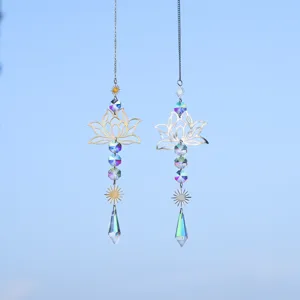Detailed view of hanging metal lotus sun catchers with sparkling K9 crystal prisms for garden