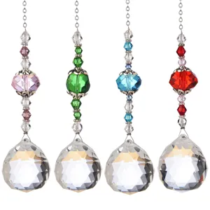 Set of four colorful faceted crystal ball suncatchers for indoor window hanging decoration