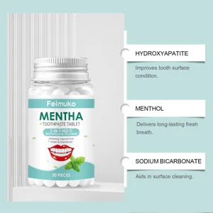 Detail view of Feimuko toothpaste tablets bottle showing key ingredients and benefits