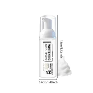 Mousse blanchissante pour les dents 60ml avec pompe affichant les dimensions de la bouteille