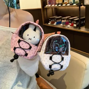 Detail view of cute mini polka dot backpack keychain for small plush doll display