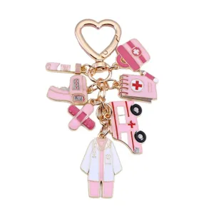 Pink medical nurse themed keychain set with ambulance and medical charms in gold finish