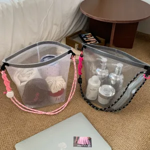 Large capacity EVA waterproof mesh beach bags shown in a lifestyle storage setting