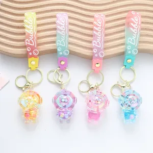 Colorful astronaut liquid quicksand keychains with Bubble silicone wrist straps.