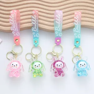 Set of four cute rabbit liquid quicksand keychains with colorful glitter and bubble straps